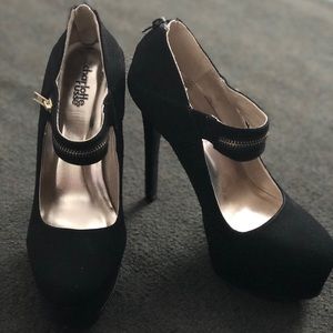 Brand new stiletto black & gold leather heels